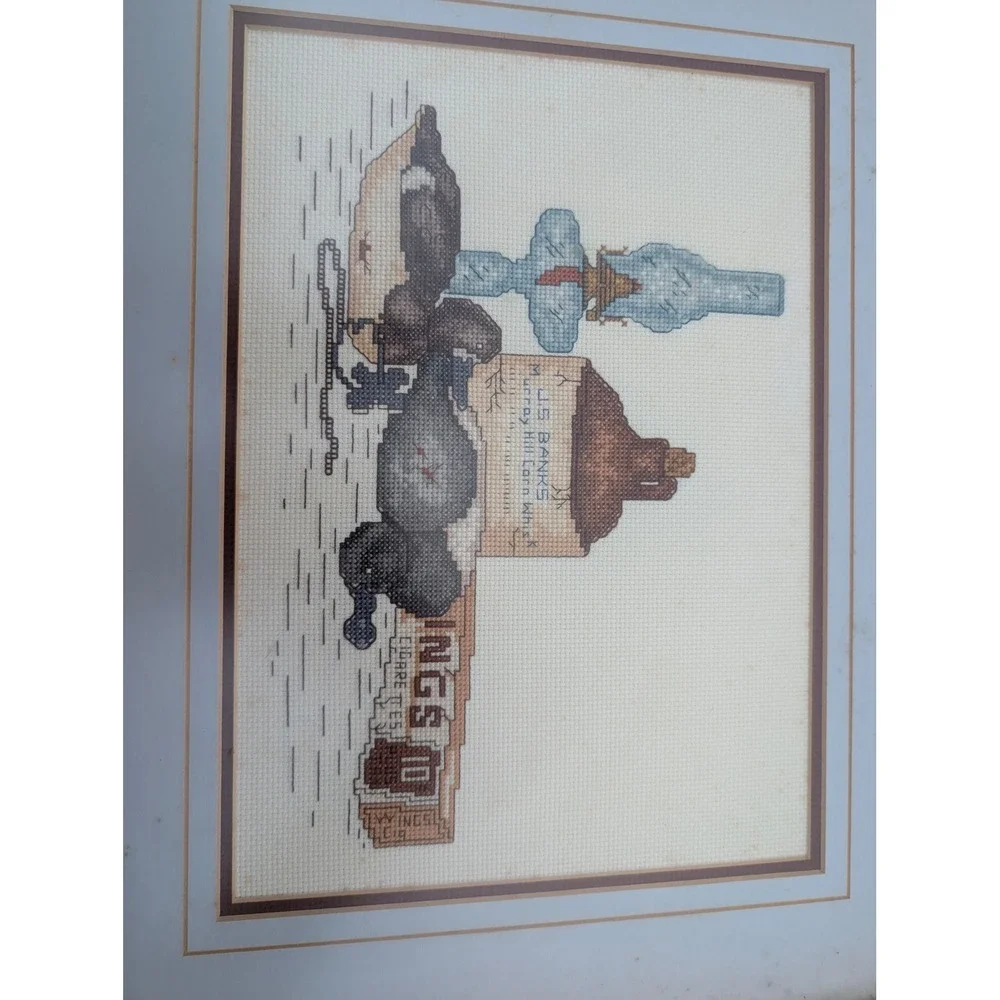 Vintage Framed Cross Stitch Duck Decoy Whiskey Jug Oil Lamp Needlepoint Art